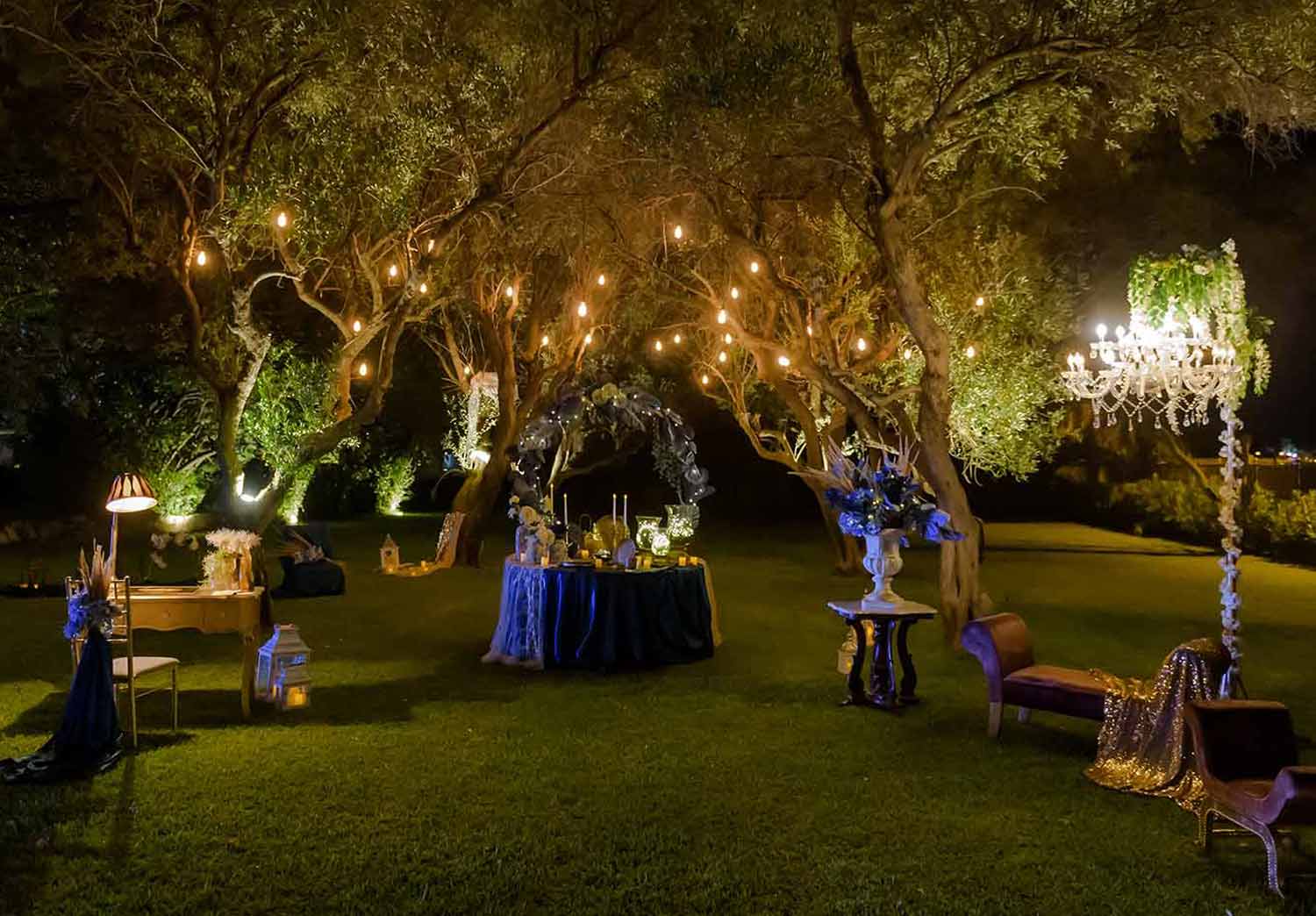 The appropriate lights on the tree branches show off the colors on the wishing table